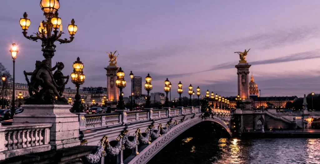 paris bridge at night