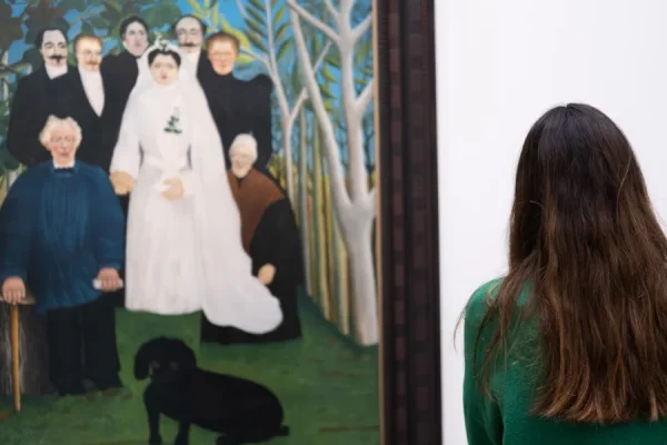 Girl looking at a painting in Musée de l'Orangerie